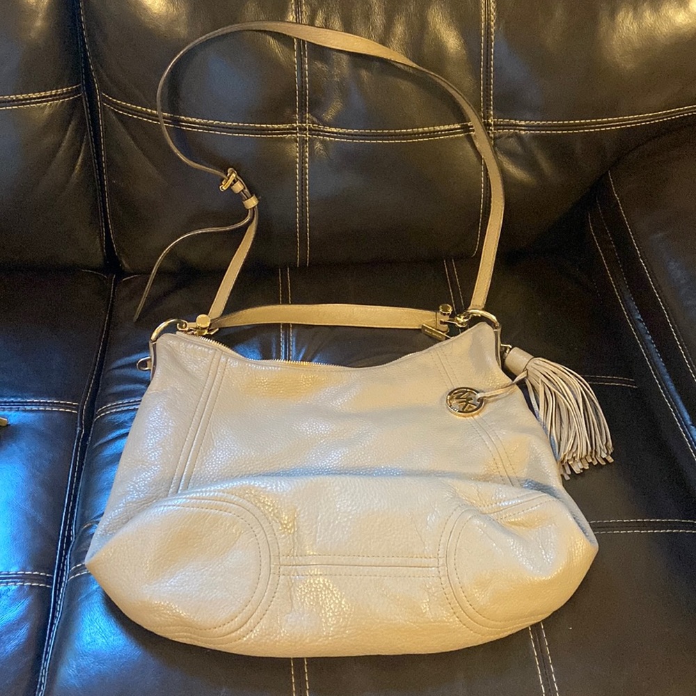 Michael Kohrs bag w/ tassel.